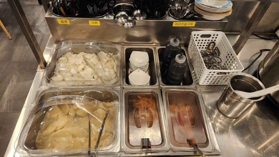 Self-serve bar with onion, danmuji, jjasai, and kkakdugi