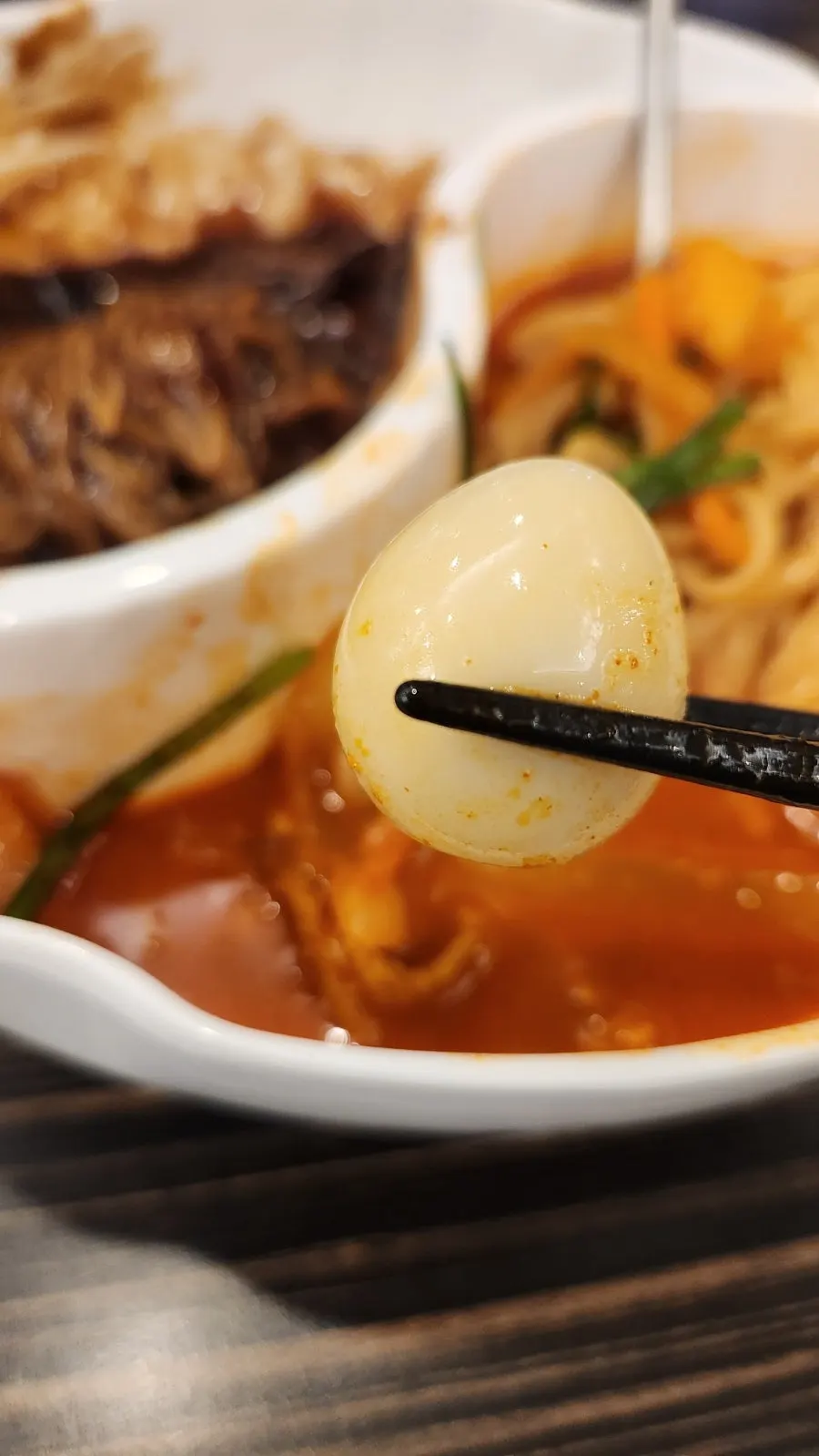 Pork and quail egg inside the jjamppong