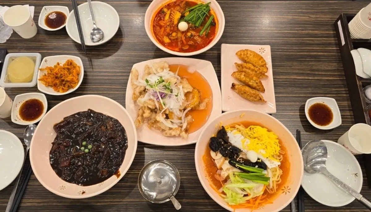 Table spread of jjamppong and tangsuyuk