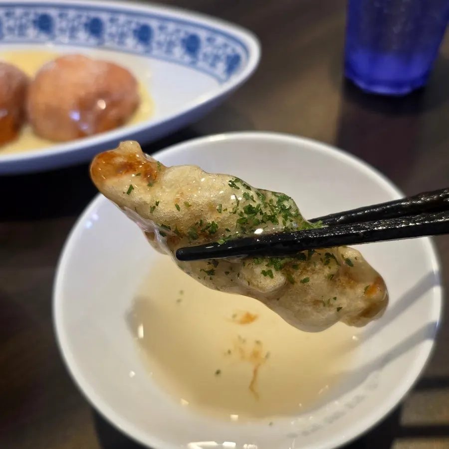 Picking up a piece of tangsuyuk