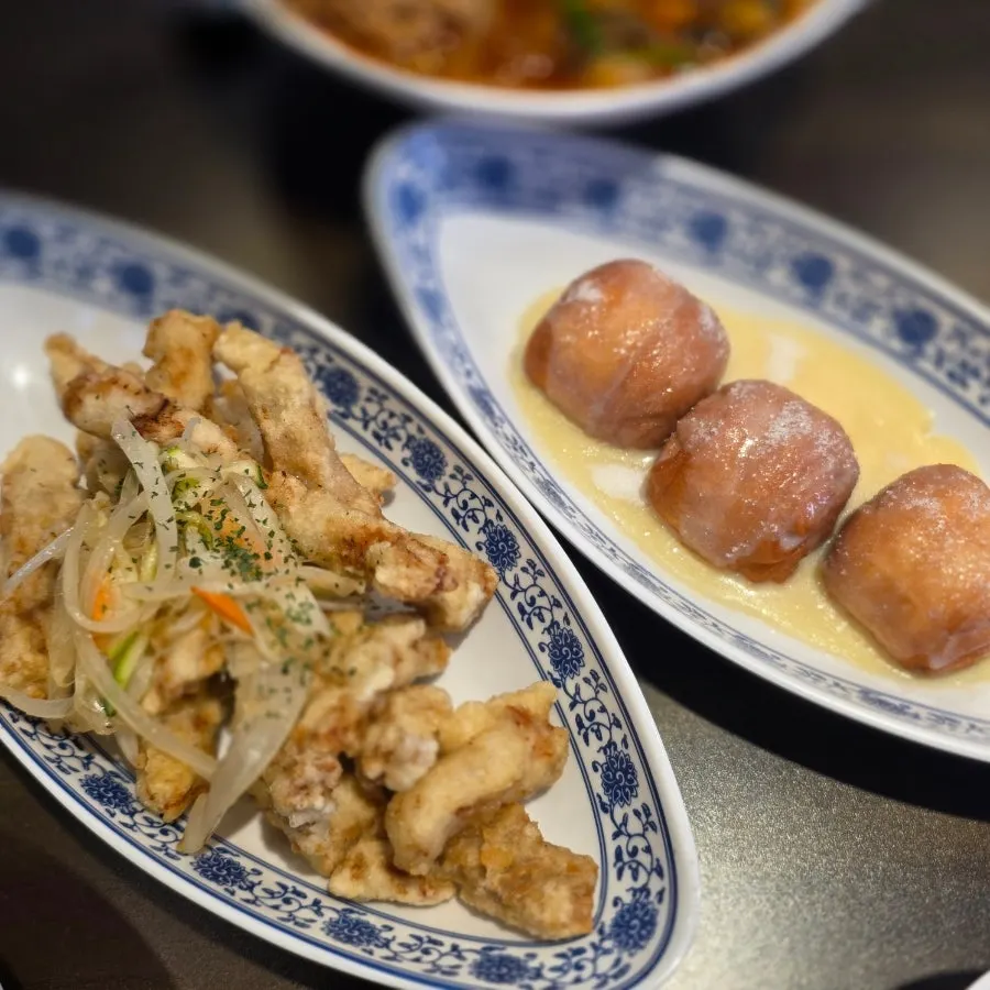 Chinese dishes plated neatly on the table