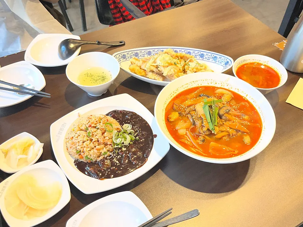 Table set with the jjambbong, fried rice and tangsuyuk set