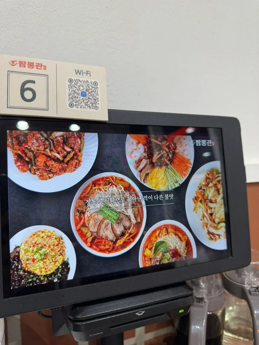 Self-serve bar corner with pickled radish and white kimchi