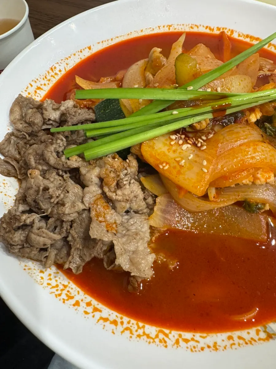 Chewy jjamppong noodles soaked in chadol broth