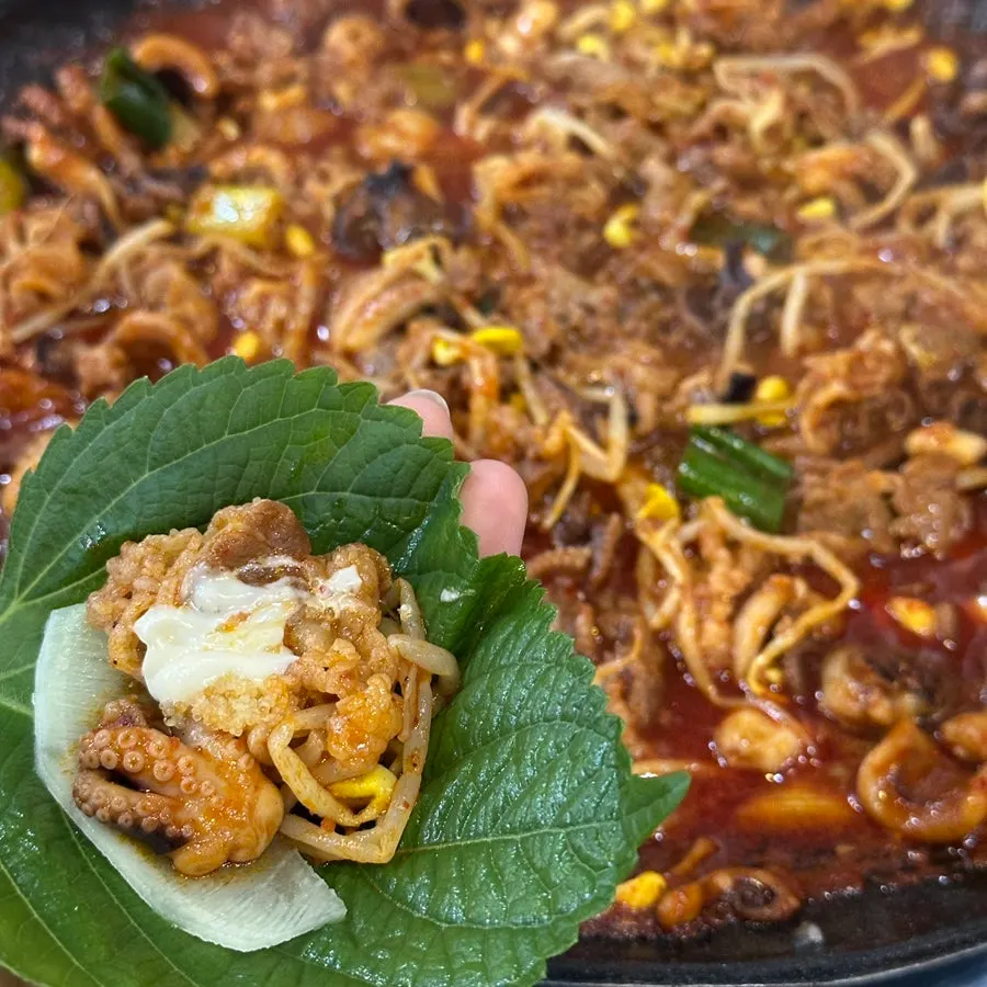 Octopus stir-fry made spicier with added chili powder
