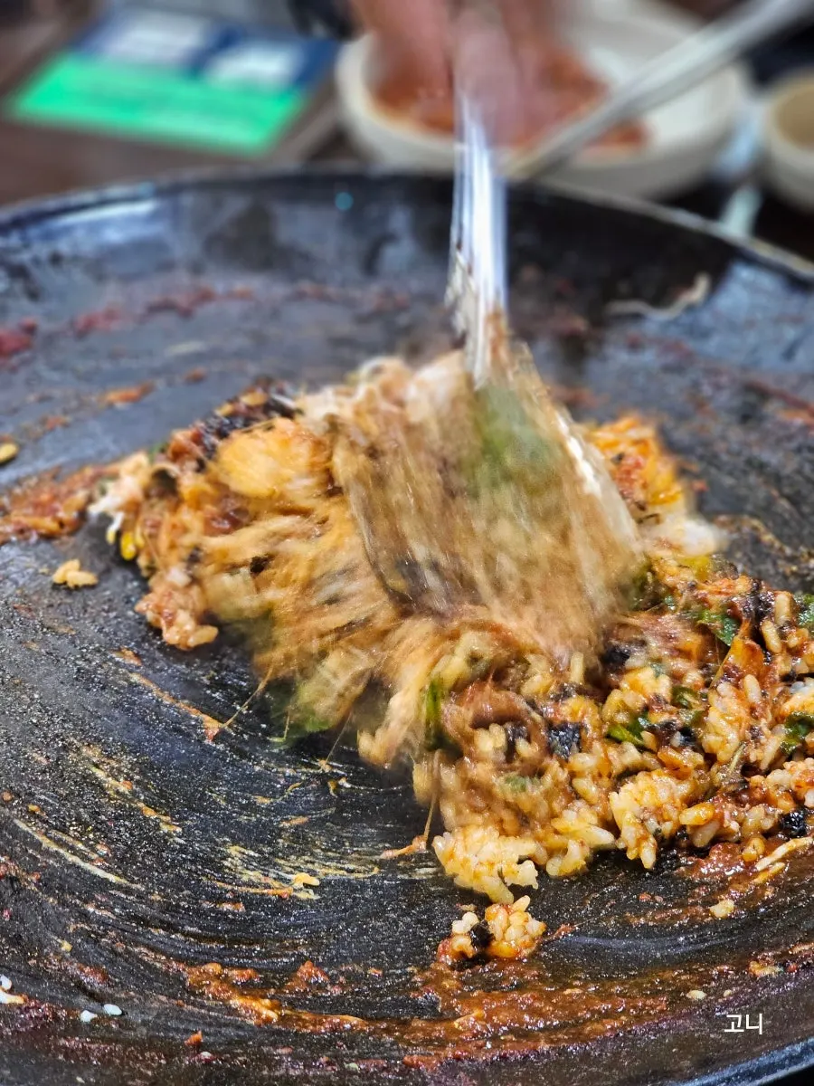 Cheese fried rice with crispy caught bits