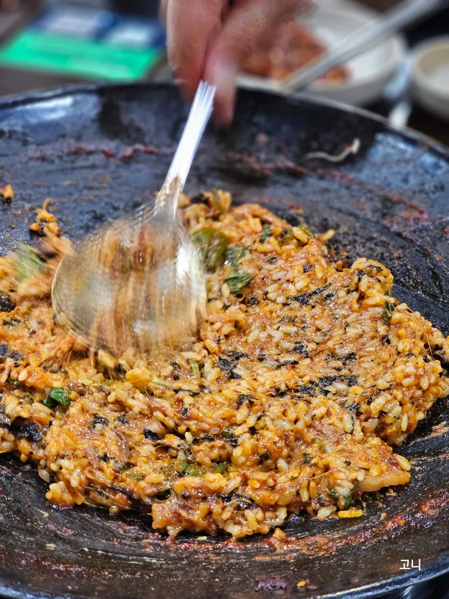 A spoonful of cheese fried rice