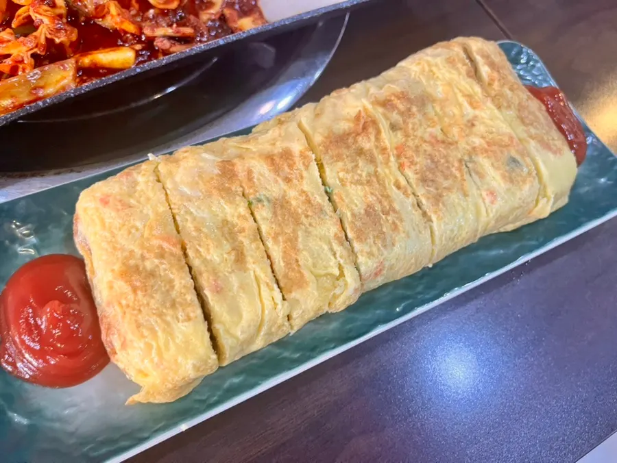 깻잎에 싸 먹는 철판치즈쭈꾸미 한 점