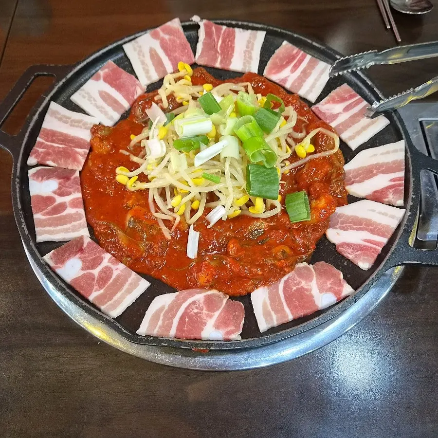 Signature octopus pork belly dish at Jjigaen Jjukkumi Yongmun Market Branch