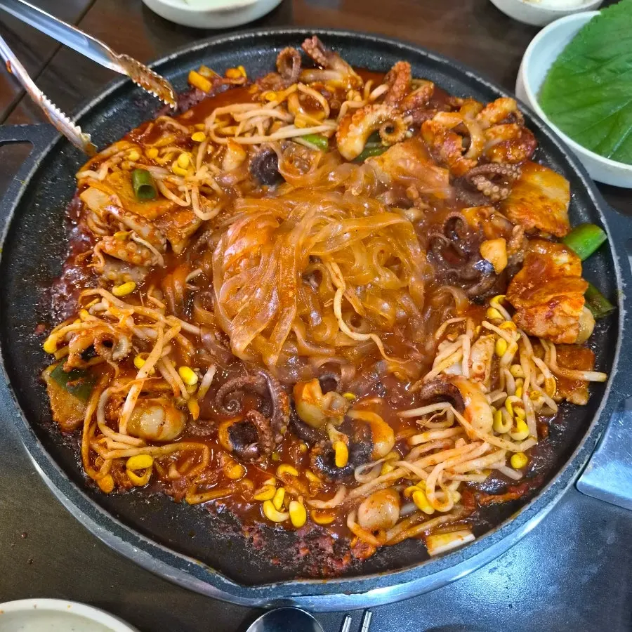 Glass noodles added into the octopus pork belly griddle