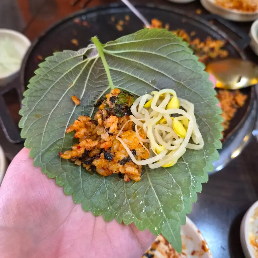 Close-up of a spoonful of crisped fried rice