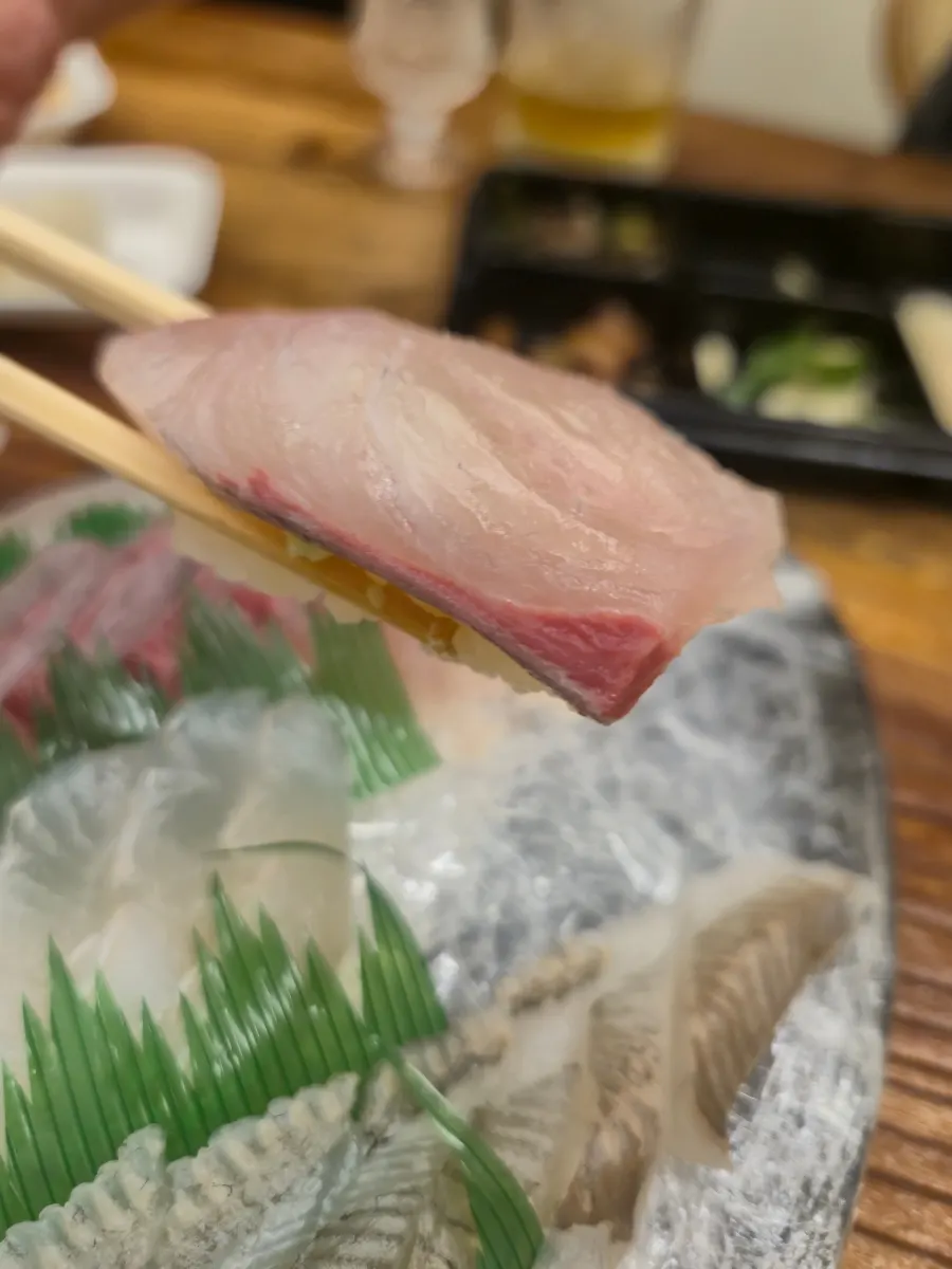 Self-made sushi topped with sashimi over rice