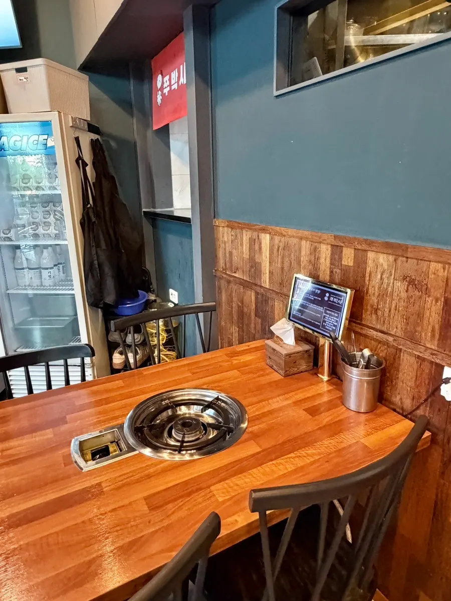 Outdoor tent seating at Jju Baksa Magok Branch
