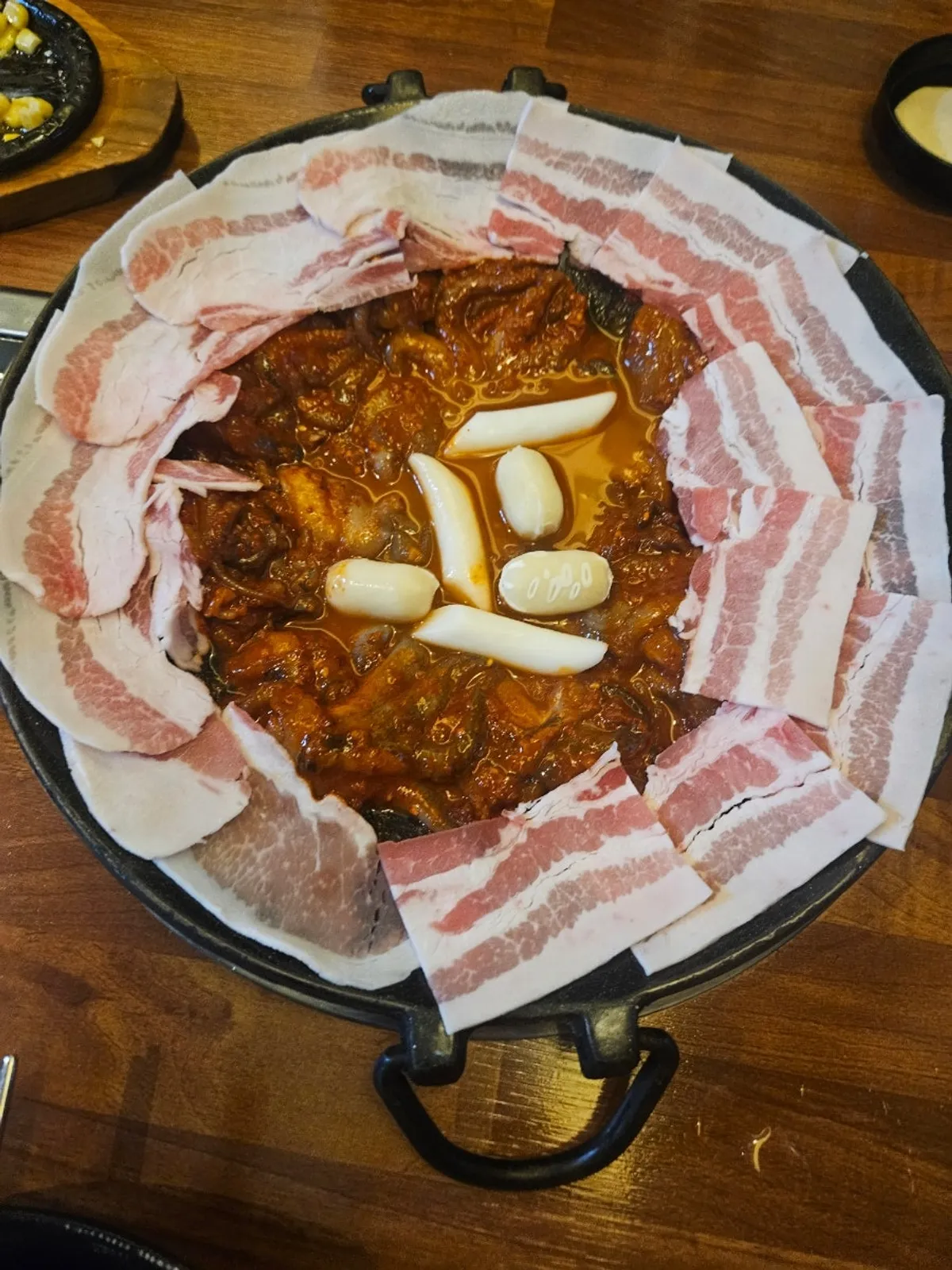 Webfoot octopus and pork belly on the griddle