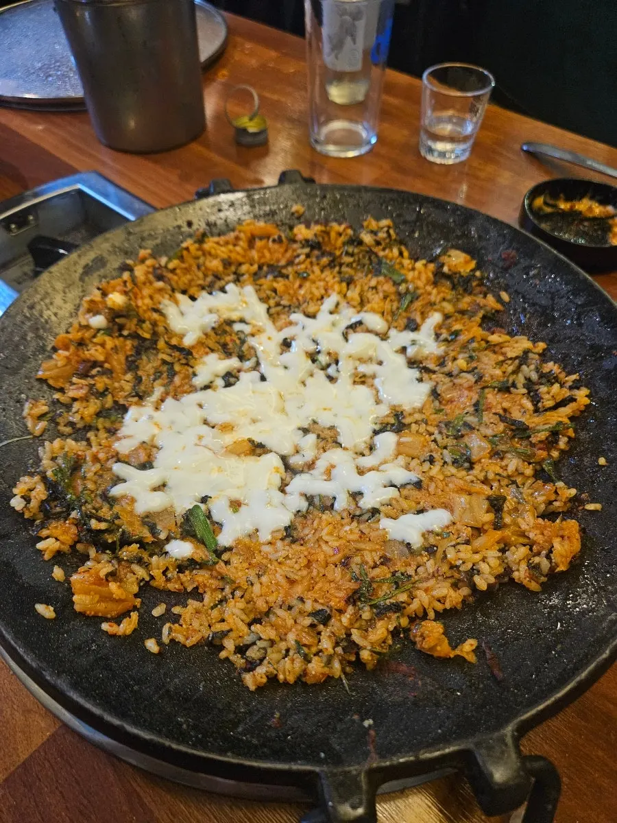A plated portion of flying fish roe cheese fried rice