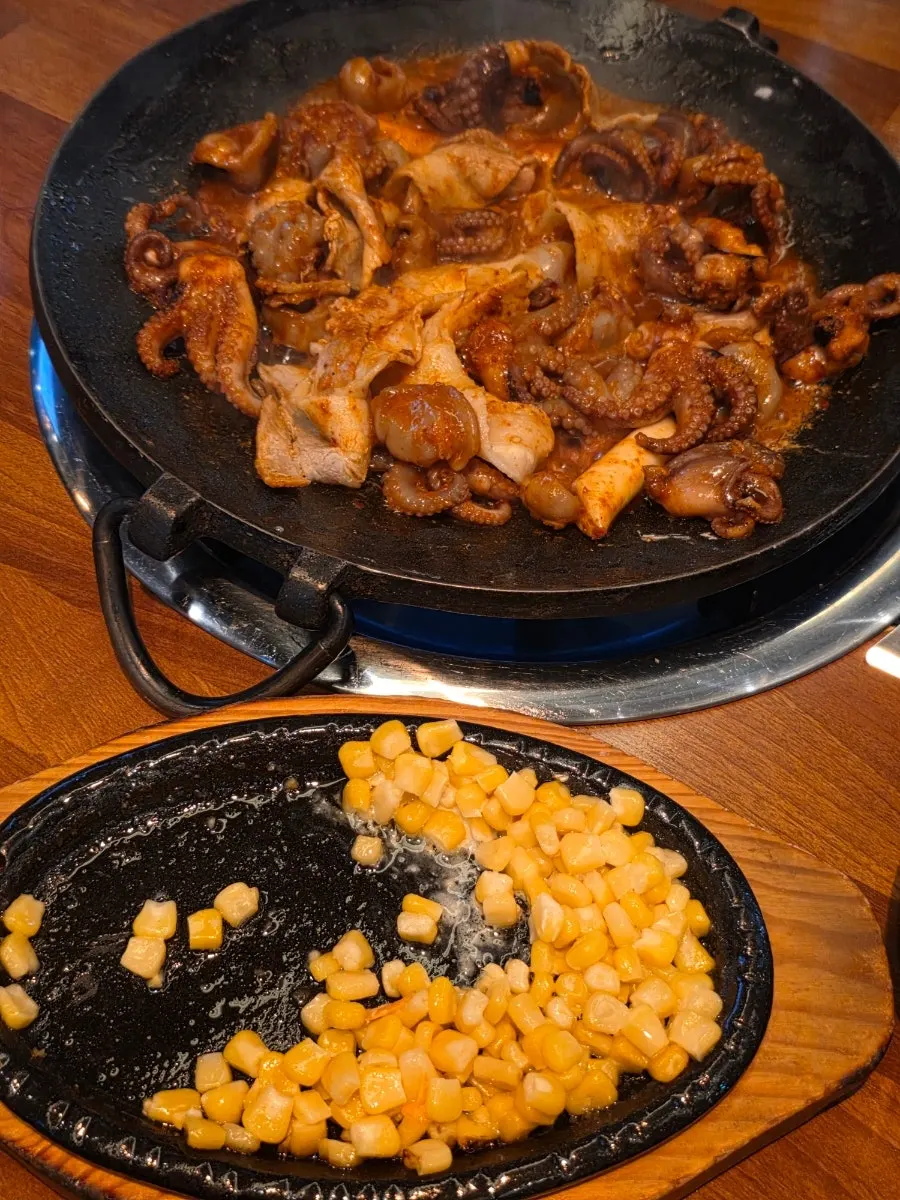 Corn cheese added to the octopus hot plate