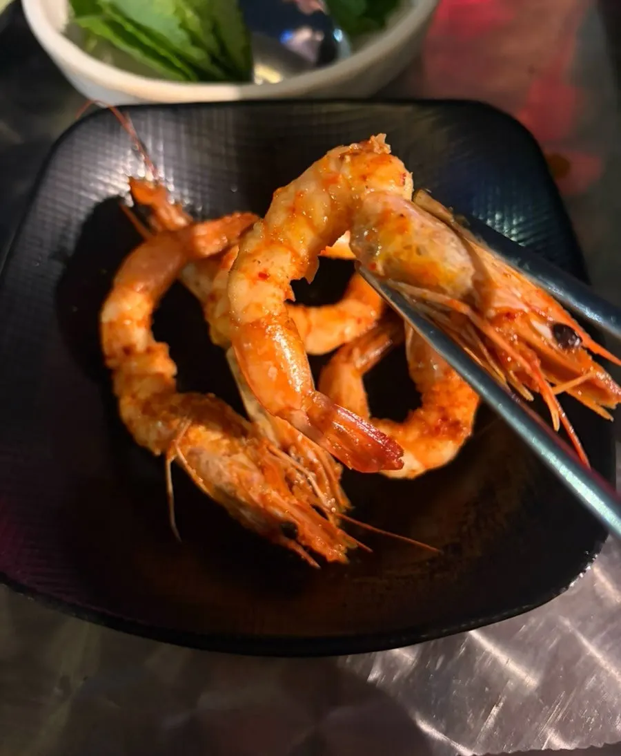 Cheese rice cake stretching on top of the octopus