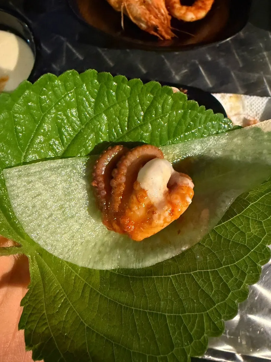 Perilla leaf wrap with pickled radish, octopus and pork belly