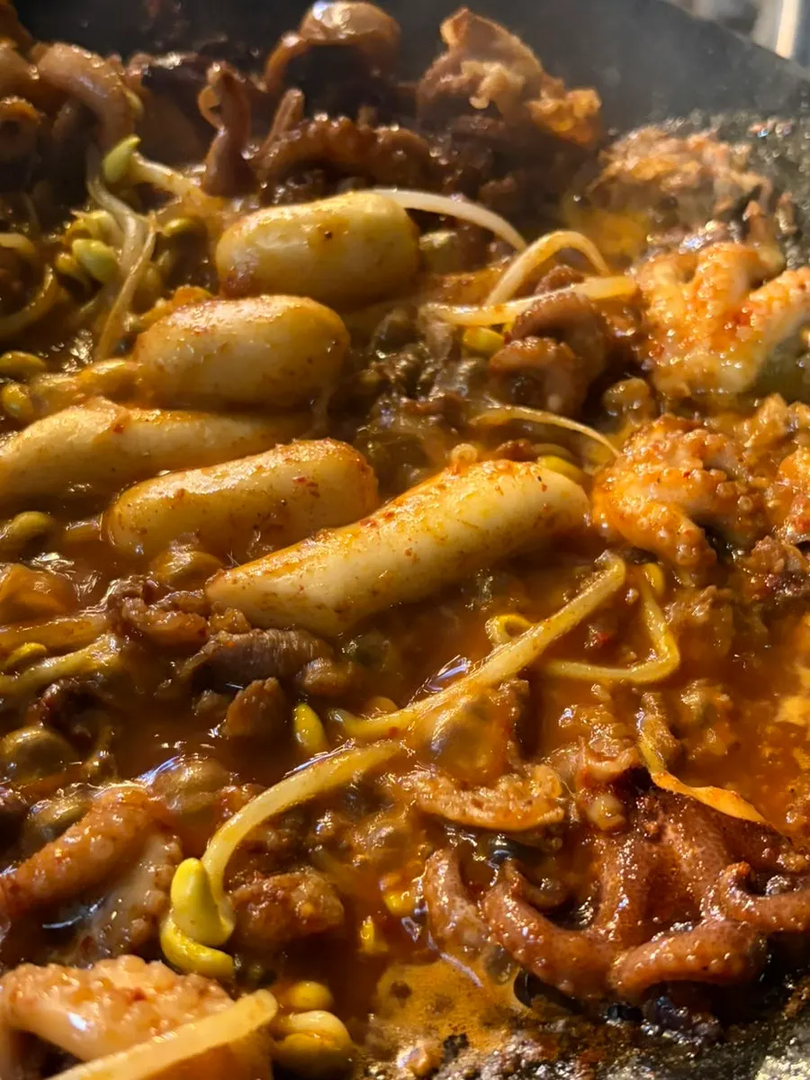 Close-up of jjuusam being grilled