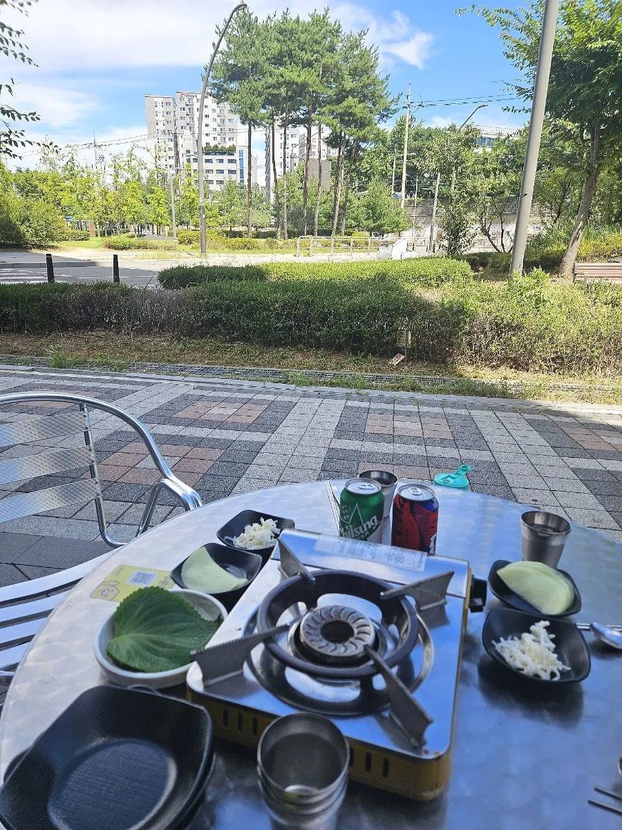 Side dishes and egg soup on the outdoor terrace table