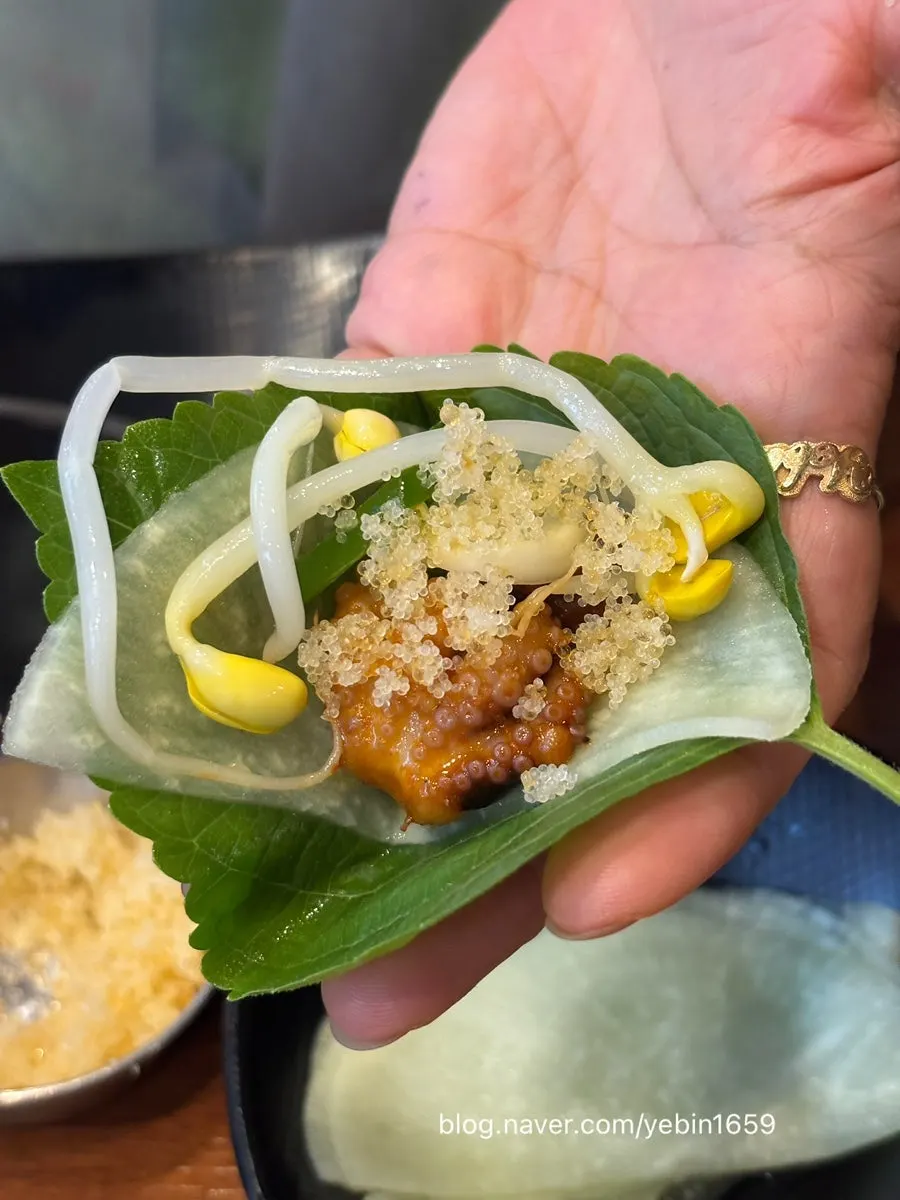 Perilla leaf wrap with octopus and flying fish roe