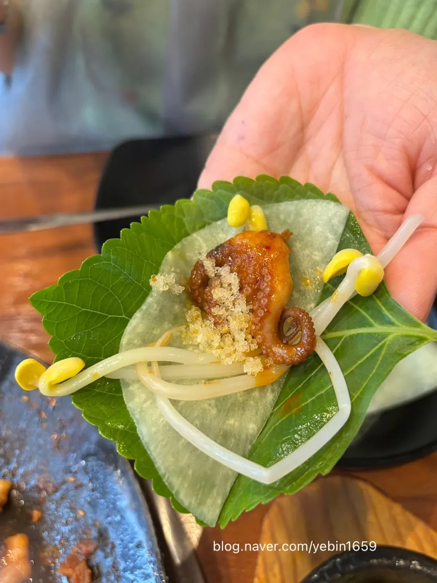 Octopus wrap with radish kimchi and bean sprouts