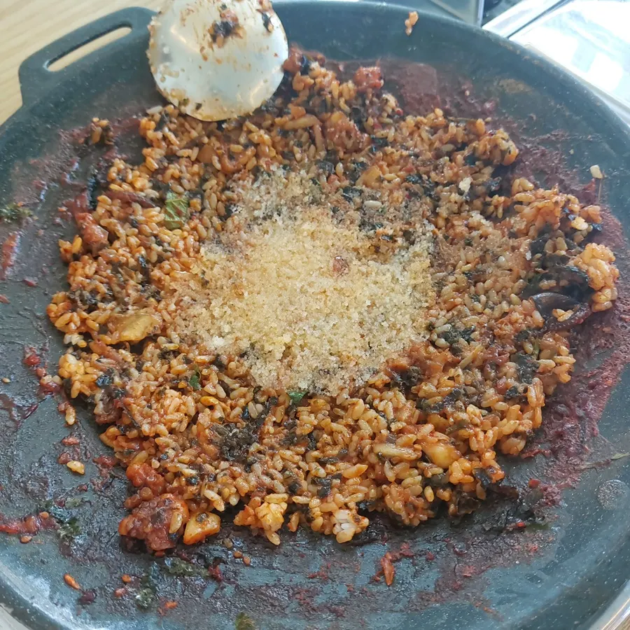Jjukkumi fried rice generously topped with flying fish roe