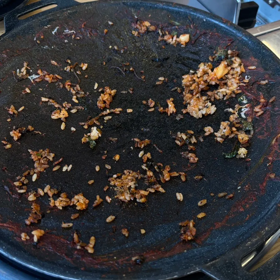 A full pan of stir-fried cheese fried rice
