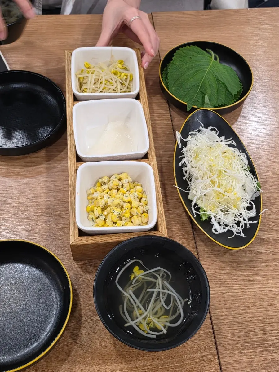 Corn salad and perilla leaves at the self bar