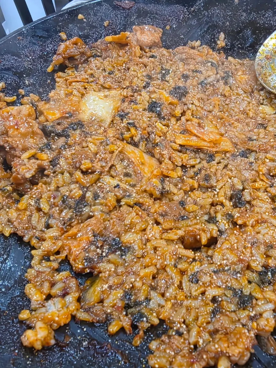 Close-up of flying fish roe fried rice stir-fried on the hot plate