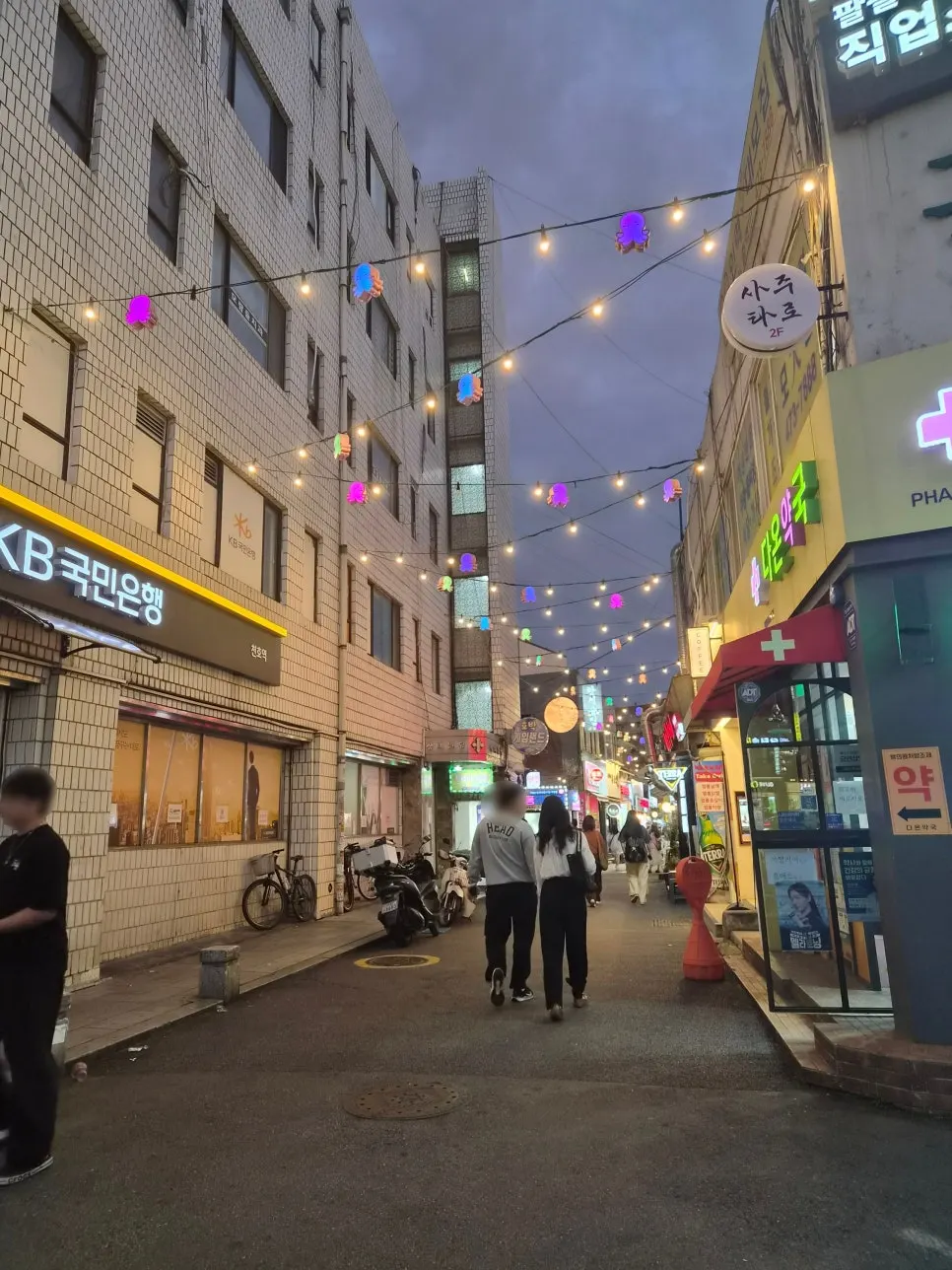 Yellow sign of Jjuksami on Cheonho's octopus alley