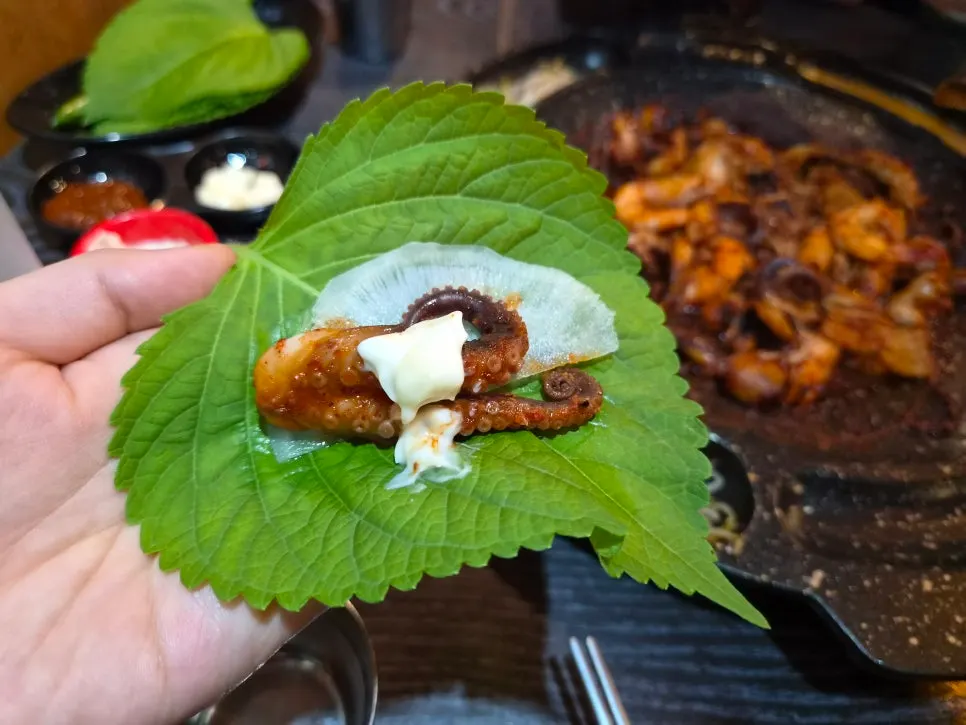 Octopus wrapped in perilla leaf and pickled radish