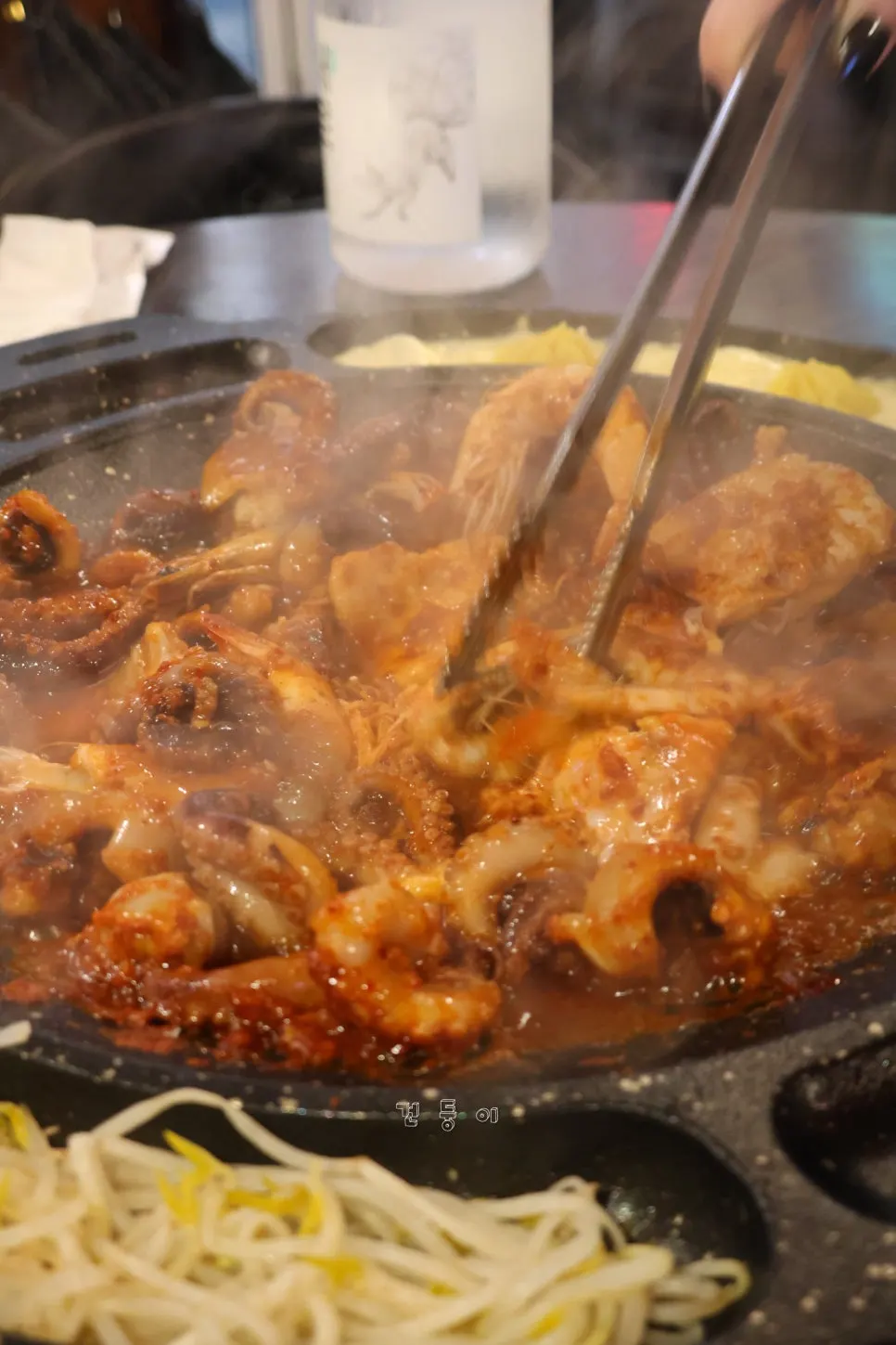 볶아지는 중인 쭈꾸미와 삼겹살 양념