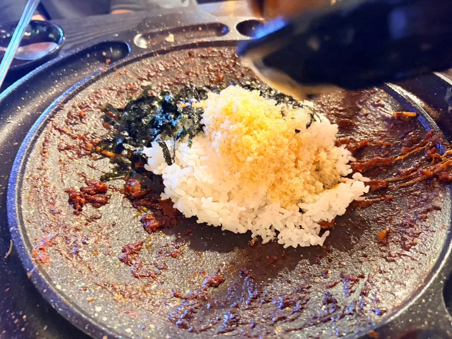 Octopus, spaghetti, and mayo wrapped in perilla leaf