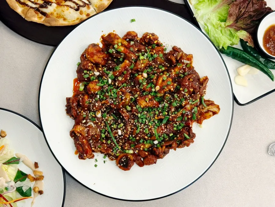 Jjukkumi stir-fry in red, glossy sauce