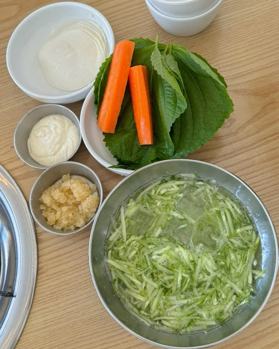 Lettuce wraps, cold cucumber soup, and radish pickle banchan