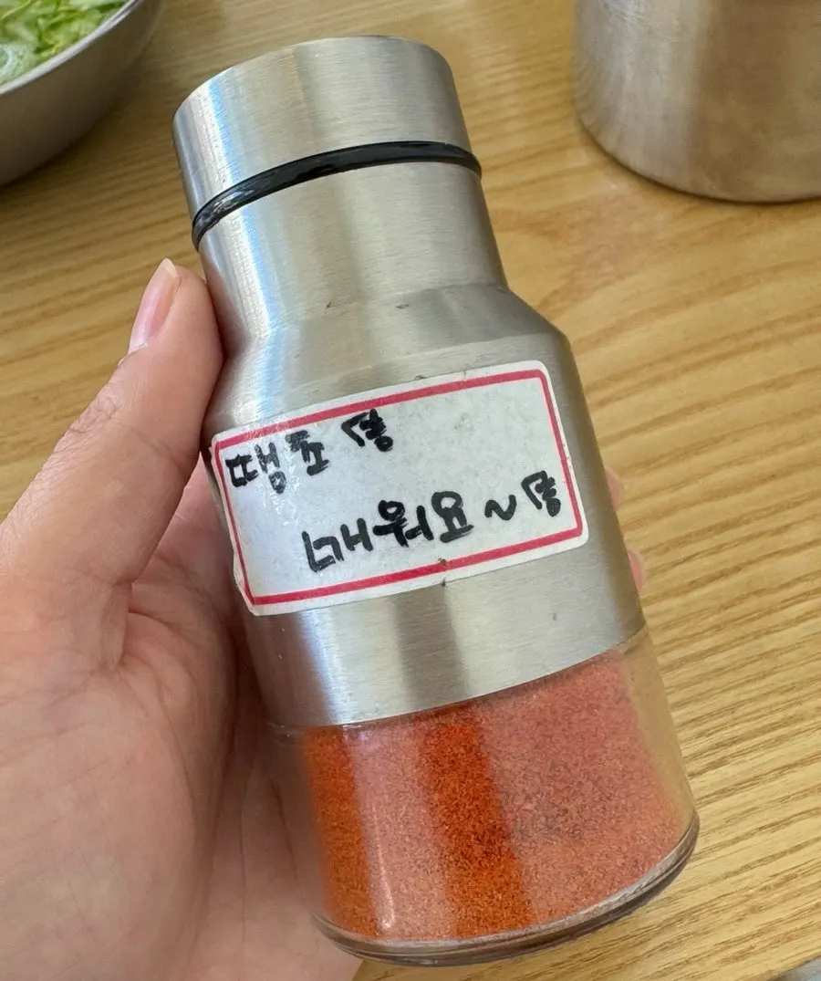 Spicy chili flakes set on the table