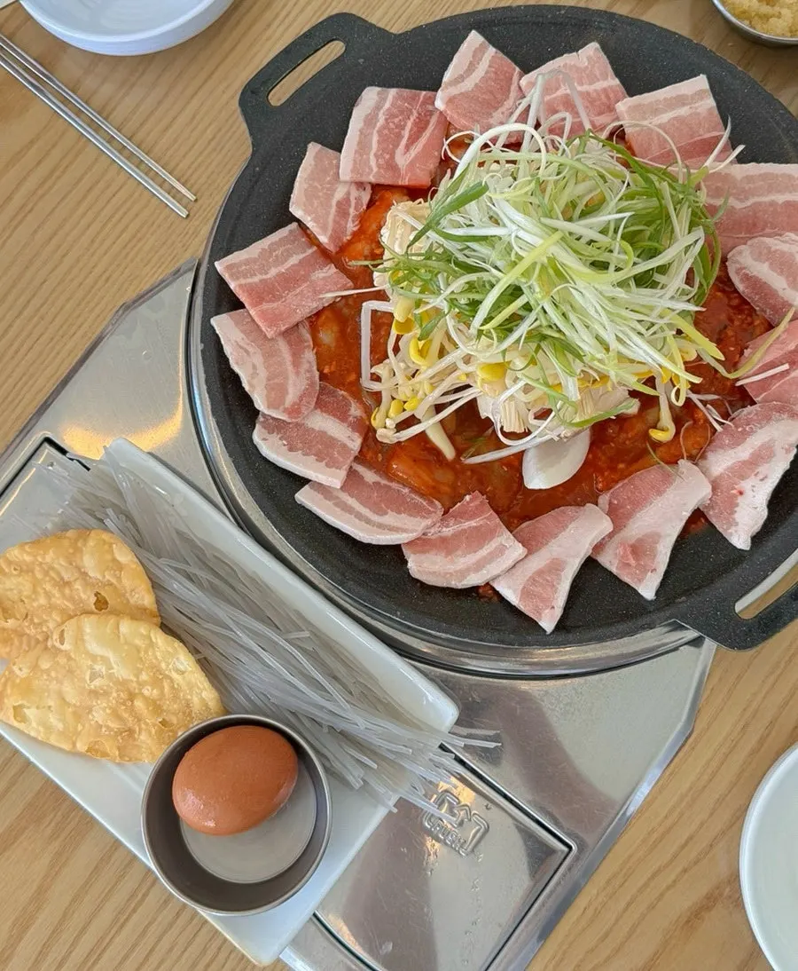 The two-person set served with sungnyung and noodle sides