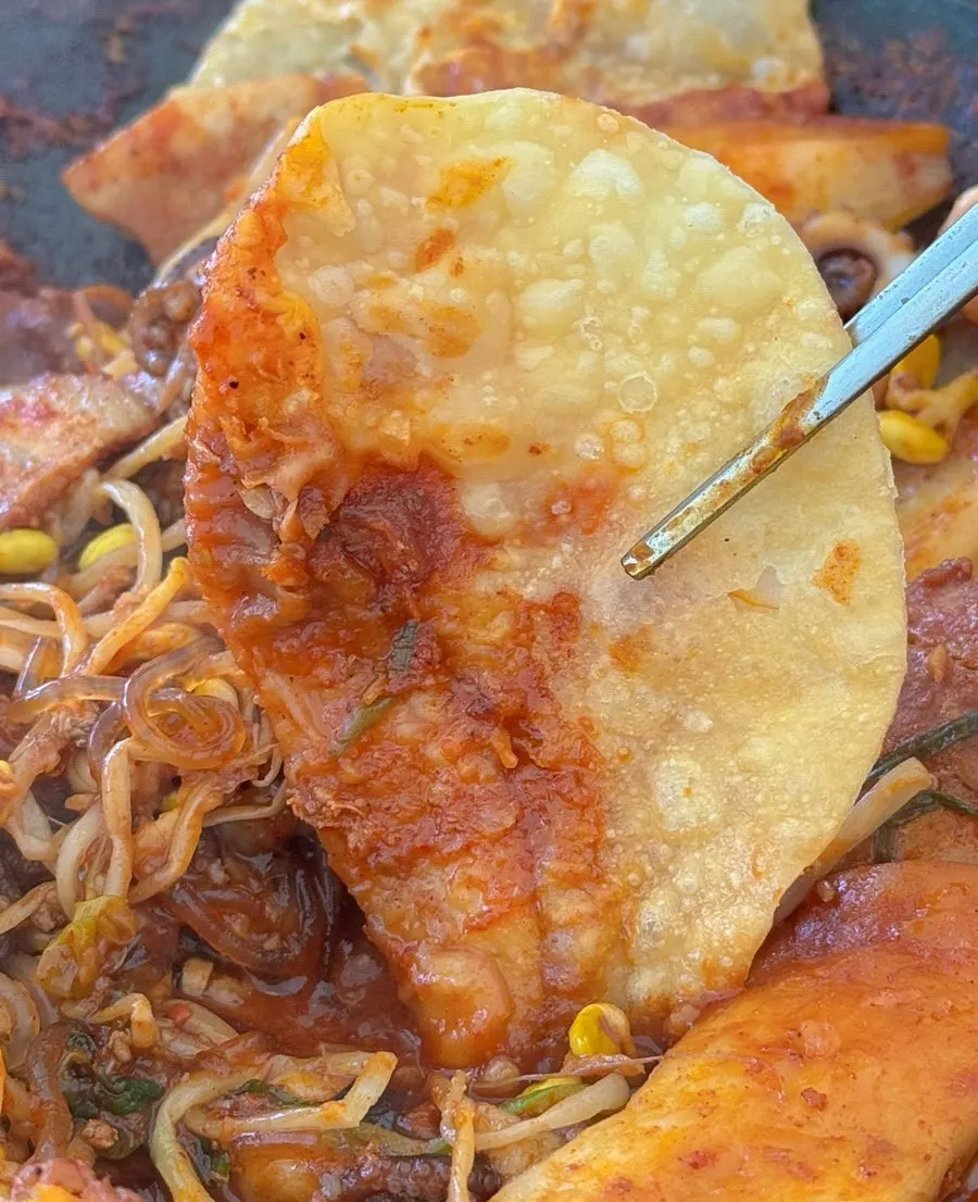 Glass noodles, rice cake, and flat dumpling sides