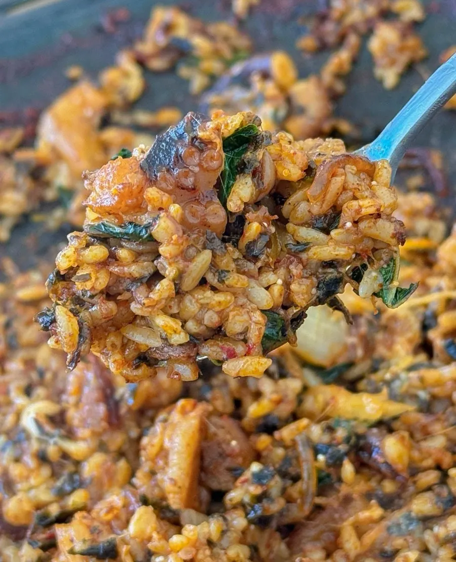 A spoonful of fried rice with added flying fish roe