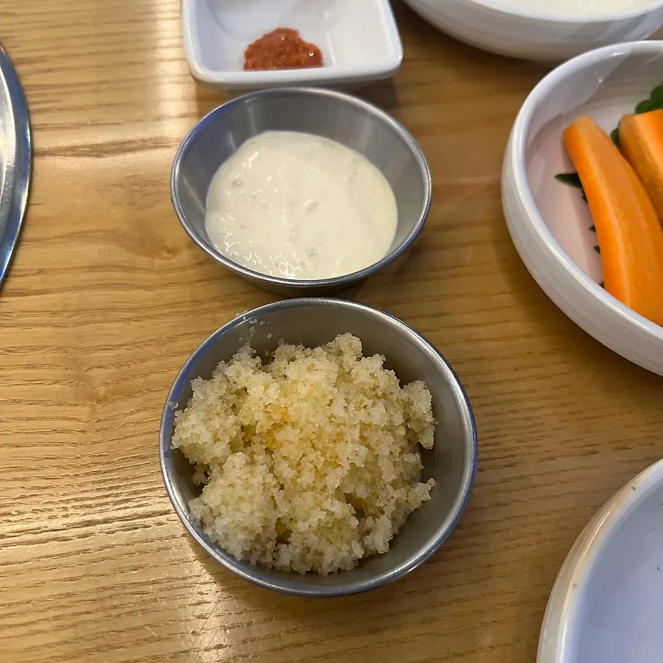 Side dish plate with perilla leaves, pickled radish, mayo sauce, and roe