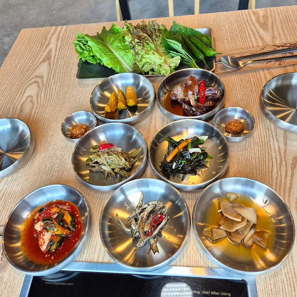Nine-side-dish spread with self-serve bar additions