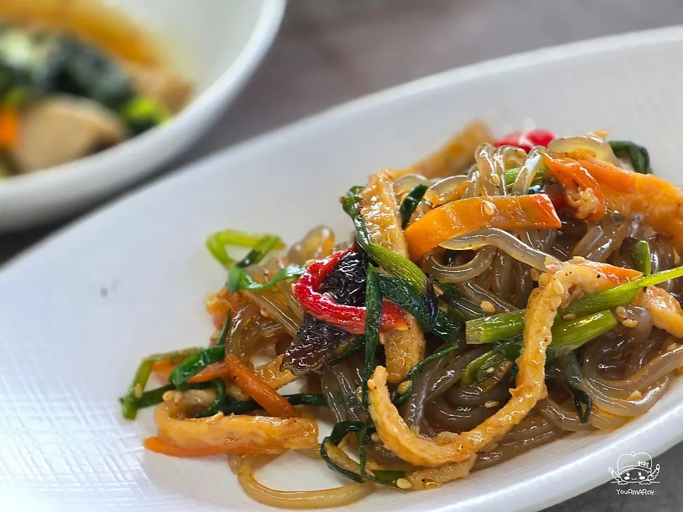 Boiled pork with spicy kimchi and japchae