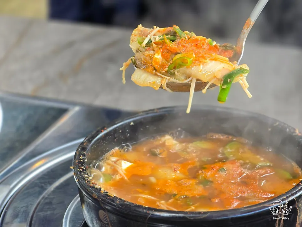 Stone-pot doenjang jjigae with tofu and zucchini