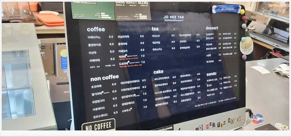 Menu board at Jo Hui-tak Coffee