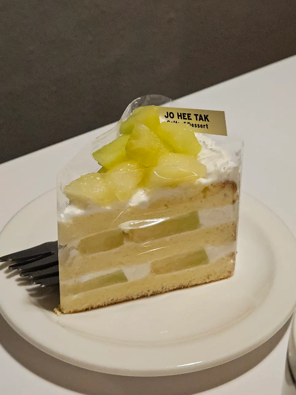 A slice of musk melon cake
