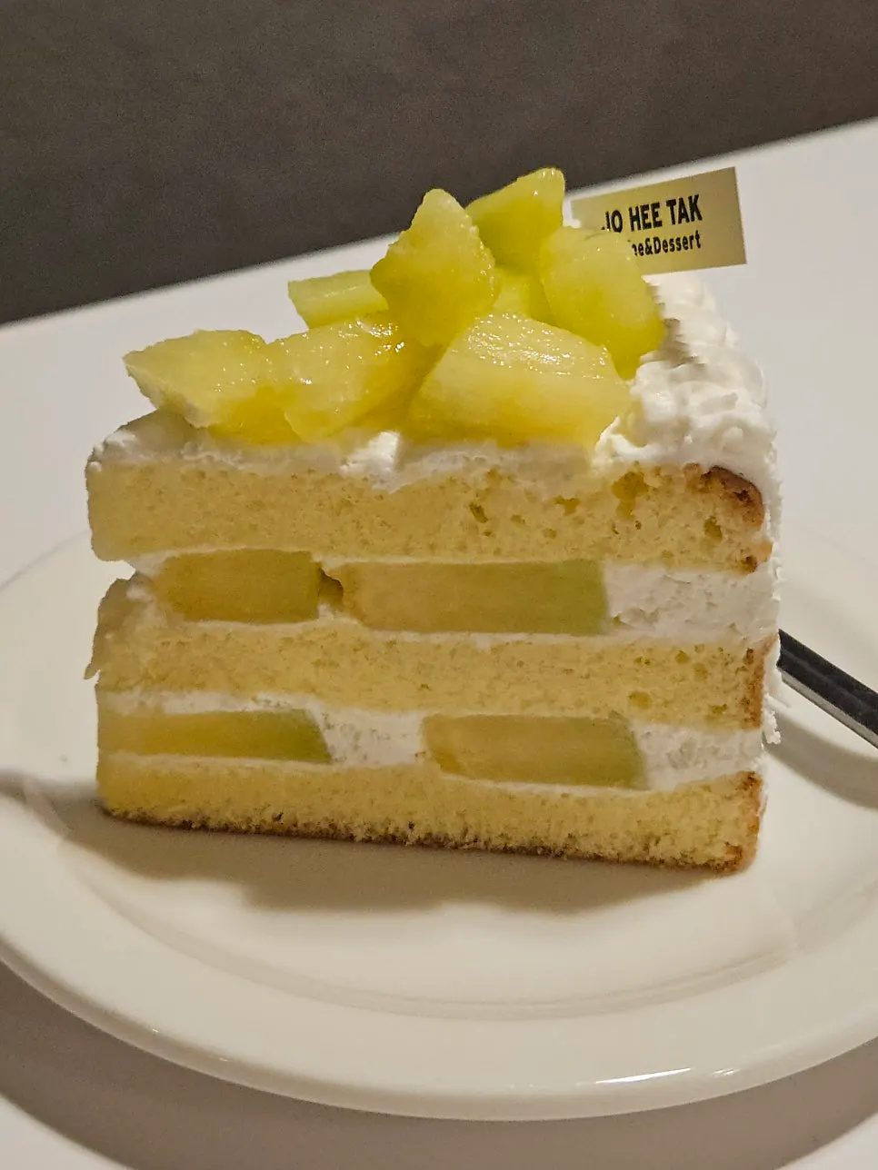 Cross-section of cake full of melon flesh