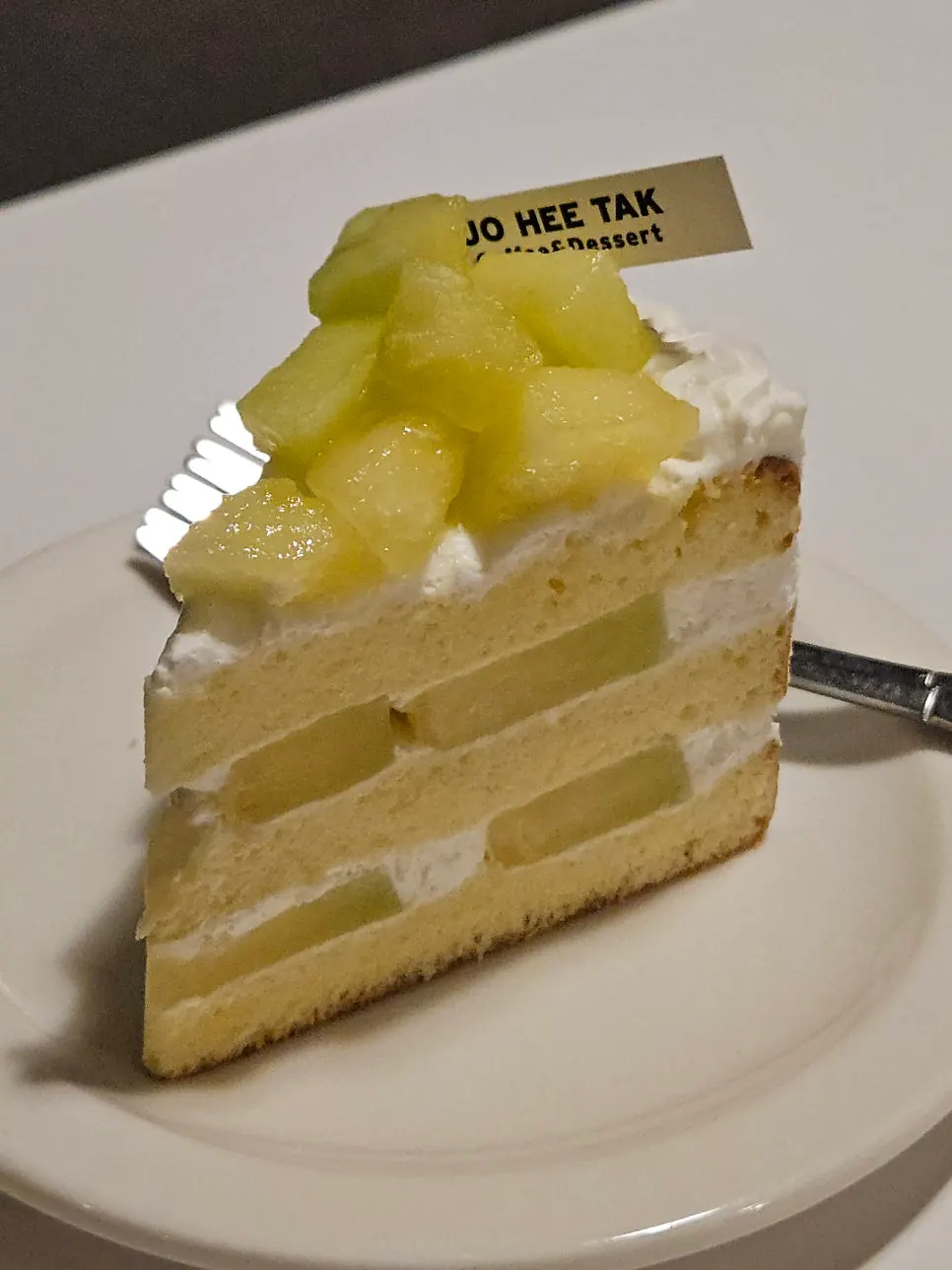 Melon cake enjoyed alongside a flat white