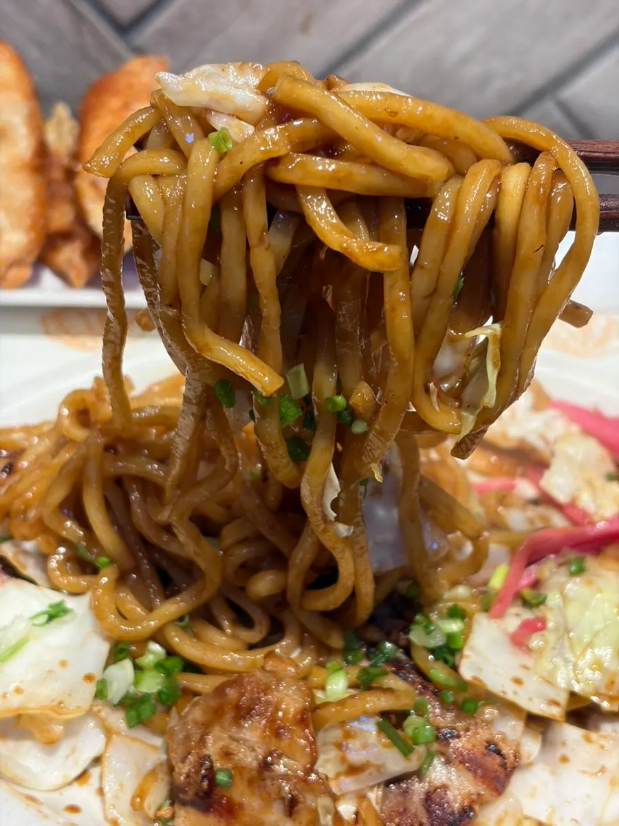 Yakisoba noodles with pork and squid mixed in