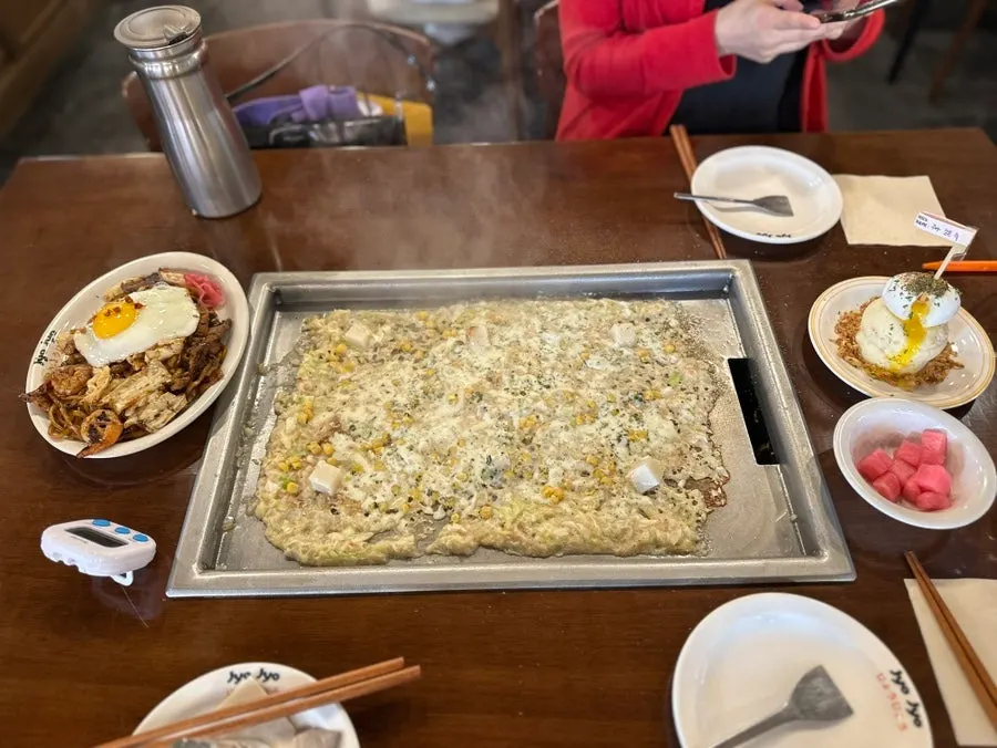 Monjayaki with melting mochi on top